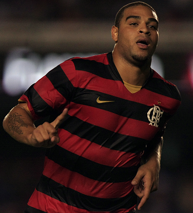 Close-up of Adriano Leite Ribeiro during a match, with a focused expression.